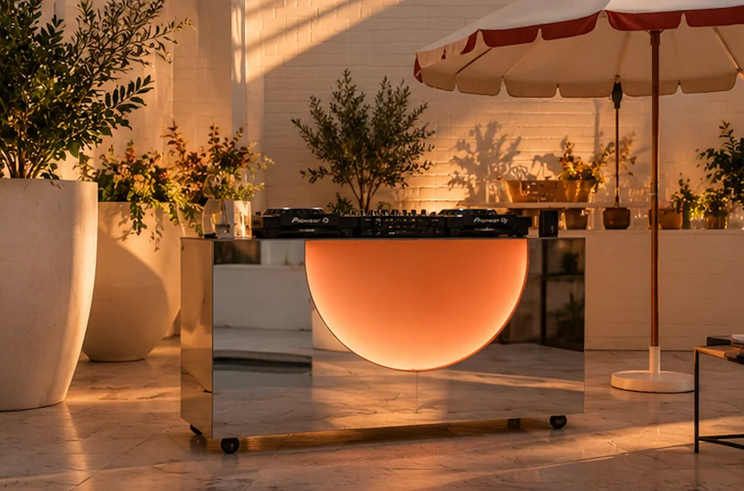Warm sunset event setting with a DJ booth