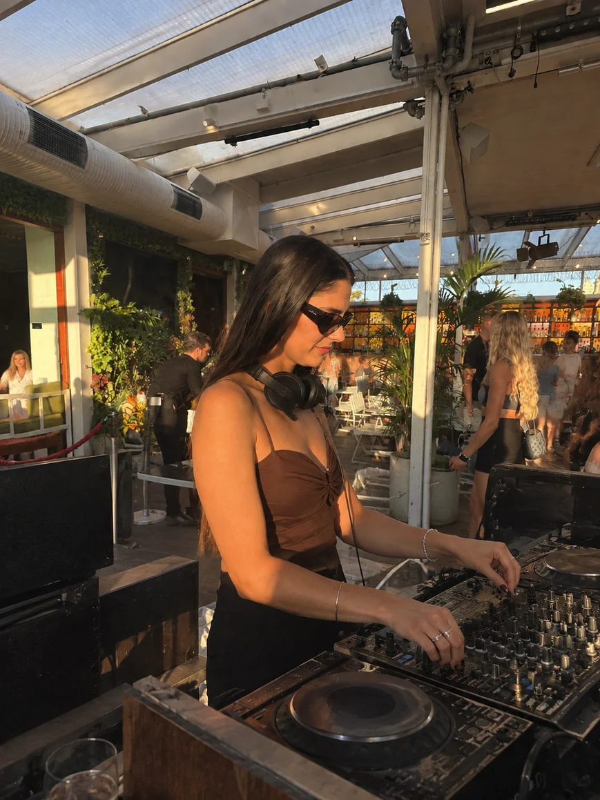 Mira Mira DJ performing at a daytime venue